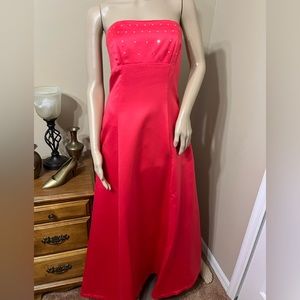 Watermelon colored Prom Dress with Rhinestones on the top.  Strapless